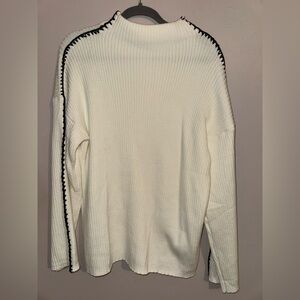 White Sweater with Black Trim